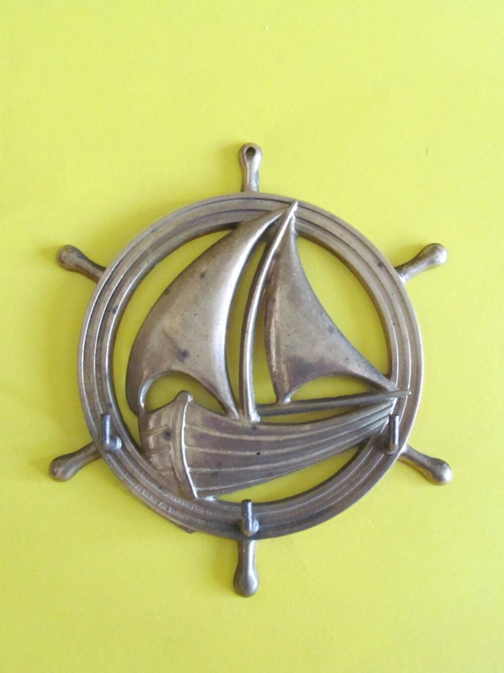 Vvintage brass nautical-themed wall hook and key rack